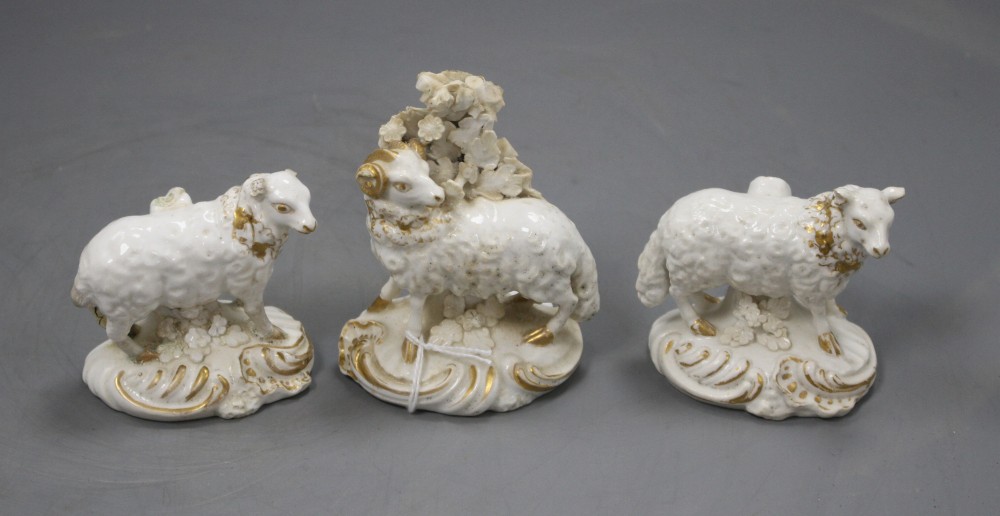 A pair of Derby gilt and white figures of a ram and a ewe, and an additional ewe, c.1810-30, h. 6.3 - 8cm (3)